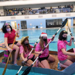 Pink team in boat