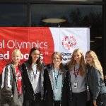 Students in front of Special Olympics Banner